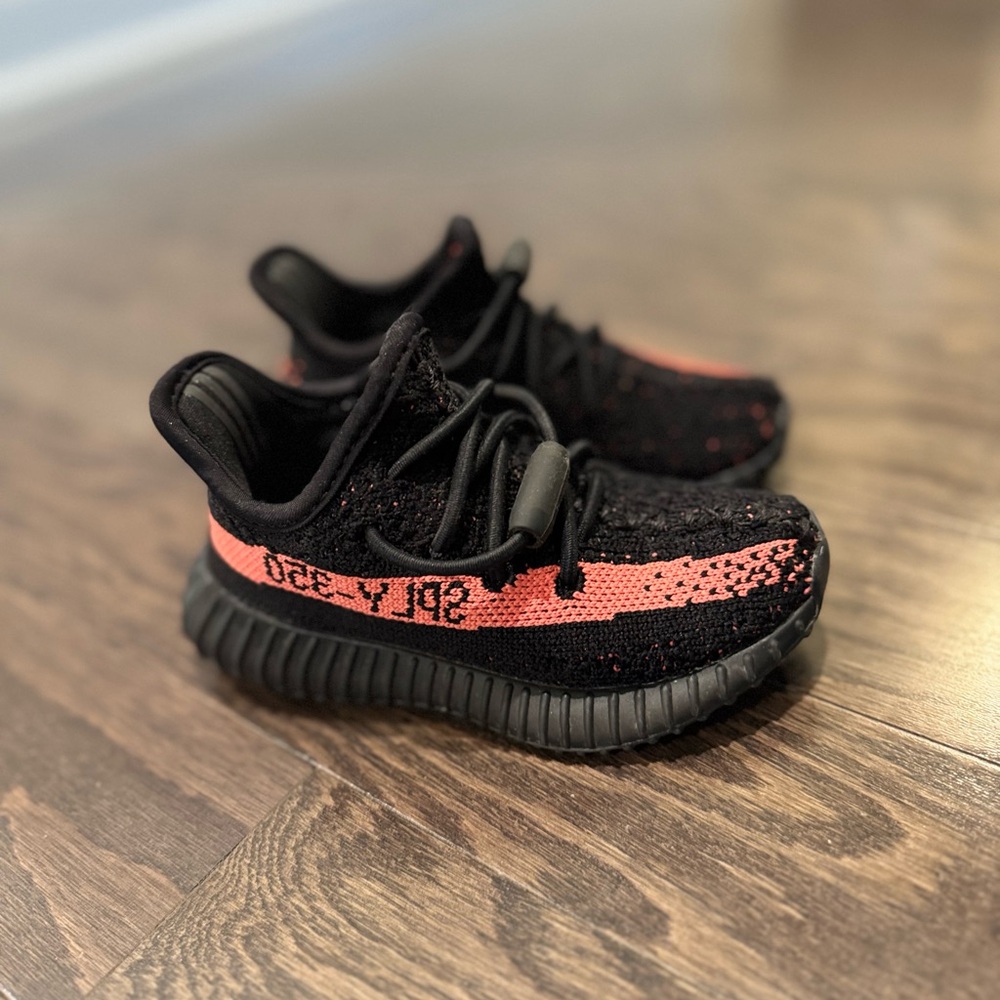 Yeezy Black and Pink Sneakers with Knit Upper and Ribbed Sole